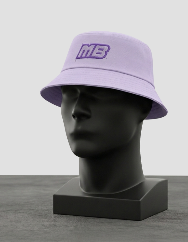 Lavender MotorBae MB Essentials bucket hat with a purple MB logo on a display head